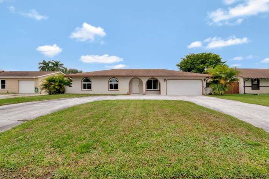 Welcome to this 3-bedroom, 2-bath home located in a desirable non-HOA community, giving you the freedom and flexibility you've been looking for. Beautiful kitchen with granite counter tops and moveable kitchen island. Impact windows and impact garage door. Big circular driveway, with plenty of room for all your cars. Big backyard with room for a pool.