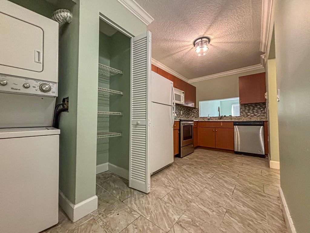 Photo of 11500 NW 42nd Street #11504, Coral Springs, FL 33065 (MLS # B26004323)