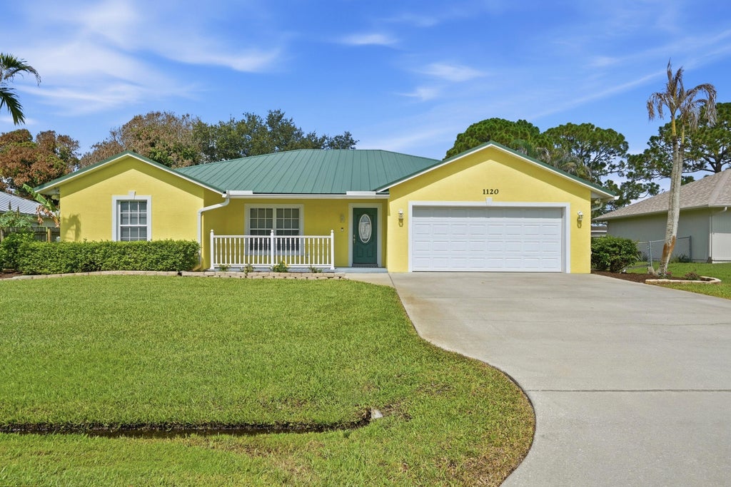 Photo of 1120 SW Irving Street, Port Saint Lucie, FL 34983 (MLS # B26057952)