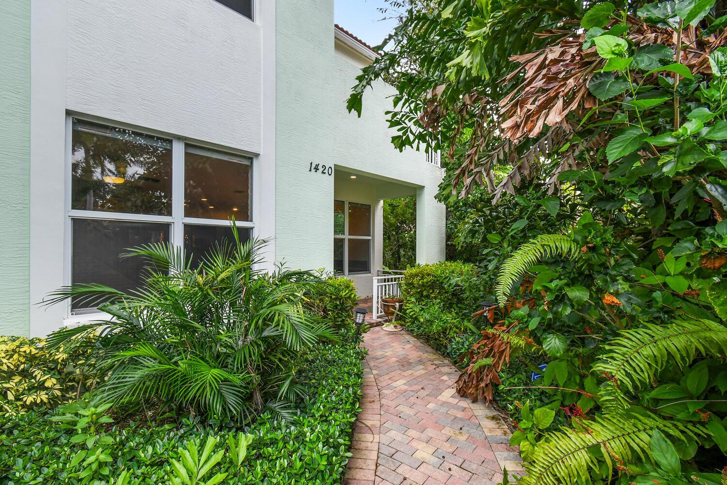 In Central Boca Raton in an A+ school district, within a gated community lies this incredibly spacious townhome. This luxurious corner-unit offers a surplus of features and exudes charm at every turn. From the marble floors to the Chicago brick to the natural light, this townhouse gives the feeling of warmth & comfort. The stylish modern kitchen, complete with shaker style cabinets, granite countertops, stainless steel appliances, & large island is a true chef's kitchen. The primary suite offers a private balcony, huge walk-in closet & ensuite bathroom with dual sinks, soaking tub & walk-in shower. With a 2 car garage, loft area & lots of additional storage, this is the perfect place to call home. The upscale townhome community of Centra offers the finest amenities including, pool,