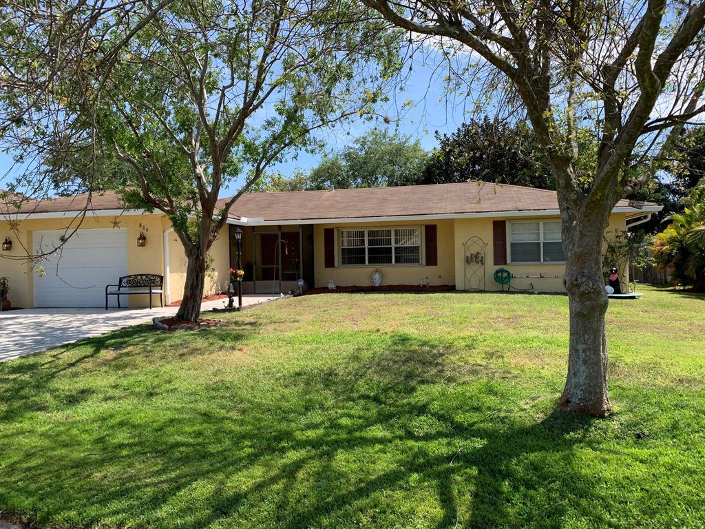 Photo of 806 SE Carnival Avenue, Port Saint Lucie, FL 34983 (MLS # R10975649)