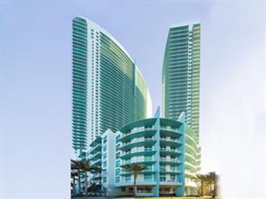 QUANTUM ON THE BAY IS A 51-STORY CONDO TOWER WITH 705 UNITS LOCATED IN THE EDGEWATER DISTRICT OF MIAMI. 1 BEDROOM. 1.5 BATH. TERRACE UNIT AREA 838 SQ FT 77.85 SQ METERS. TERRACE 130 SQ FT 12.07 SQ MTS. TOTAL AREA 968 SQ FT 89.92 SQ METERS. STUNNING UNIT IN THE HEART OF EDGEWATER MINUTES FROM DOWNTOWN, MIAMI BEACH AND AIRPORT. TOP OF THE LINE BRANDNEW WASHER AND DRYER. NEAR TRANSPORTATION, RESTAURANTS, AND SHOPS. BUILDING HAS PLENTY OF RESORT STYLE AMENITIES: HEATED POOL 1,400 SQ FT, POOL SUN DECK 15,000 SQ FT, SPA, MODERN 2 STORY GYM, QUIET STUDY ROOM, VIRTUAL LIBRARY, THEATER, CONFERENCE ROOM. MINIMARKET, BEAUTY SALON, DENTAL SERVICES, ETC. ACROSS MARGARET PACE PARK. PARKING SPACE: 921 CLOSE TO ELEVATOR. 2 SWIMMING POOLS,2-STORY EVENT ROOM, CYBER ROOM. l