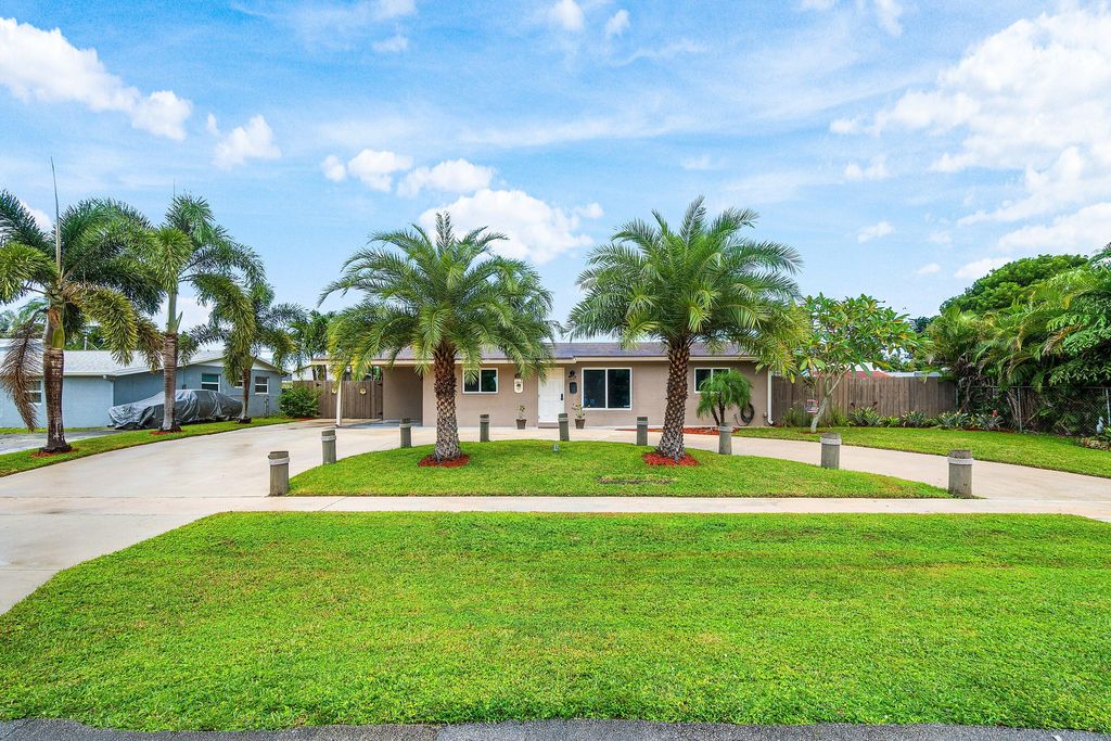 Photo of 958 Scott Drive, West Palm Beach, FL 33415 (MLS # R11127485)