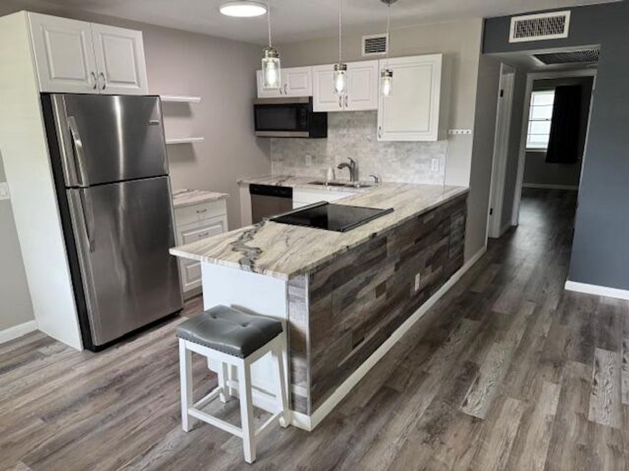 Beautiful condo in the peaceful gated community, Century Village. Condo not ready for showings until Monday, December 1st.