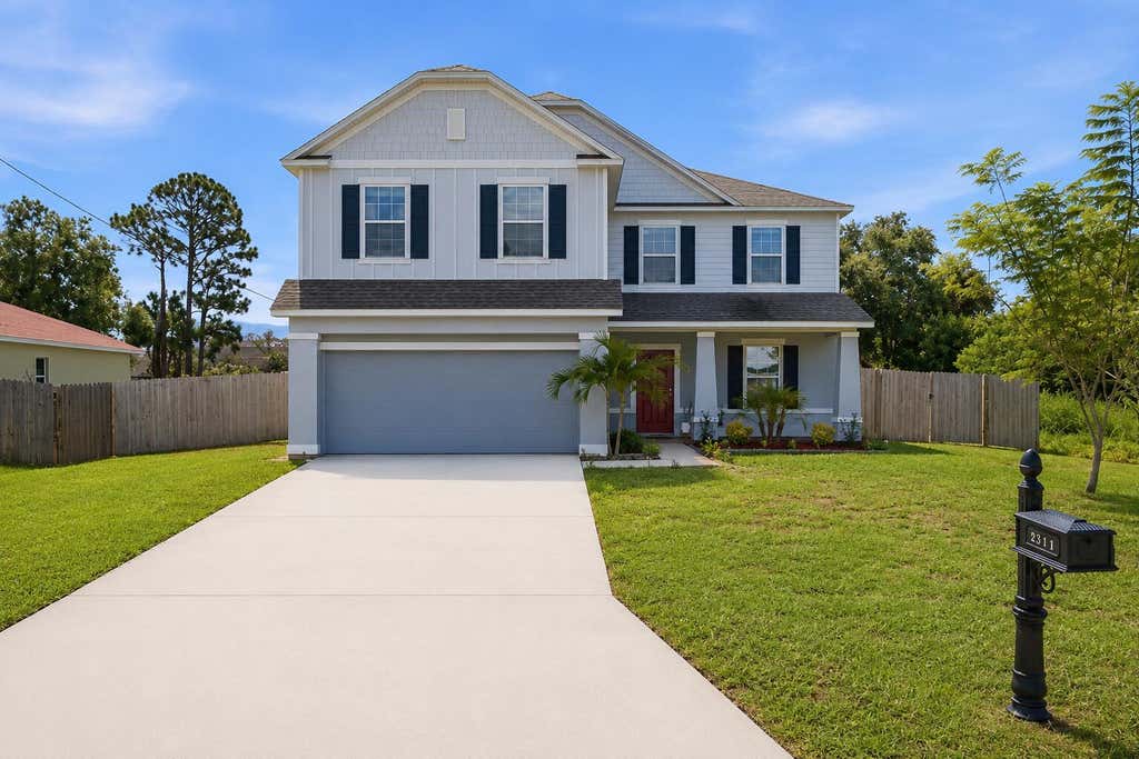 Photo of 2581 SW Westfield Street, Port Saint Lucie, FL 34953 (MLS # B26050135)