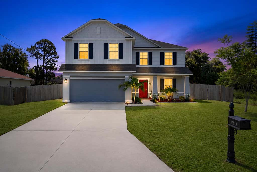 Photo of 2581 SW Westfield Street, Port Saint Lucie, FL 34953 (MLS # B26050135)