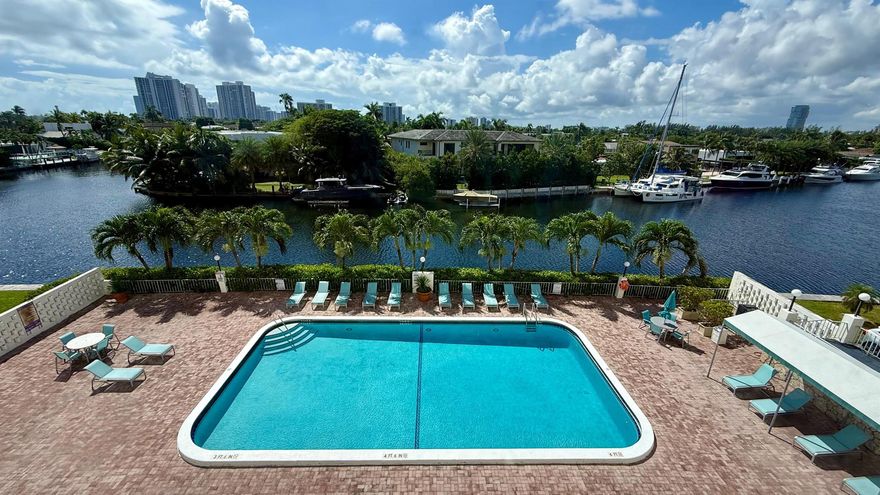 Experience coastal living at its finest in this turnkey, fully furnished corner condo in Hallandale Beach. This 2 bedroom, 2 bath residence offers a serene waterway view and stunning west-facing sunset view. Designed for comfort and style, it features high-impact windows, tile flooring throughout (no carpet), and a bright, open layout that invites relaxation. Enjoy resort-style amenities including a heated pool, sauna, fitness center, bike storage, and covered parking. Perfect for both seasonal and off-season living, this dream location is just minutes from the beach, fine dining, and all that coastal South Florida has to offer. Simply bring your suitcase, your Hallandale Beach lifestyle awaits! ALL UTILITIES ARE INCLUDED: WIFI, WATER AND ELECTRIC.