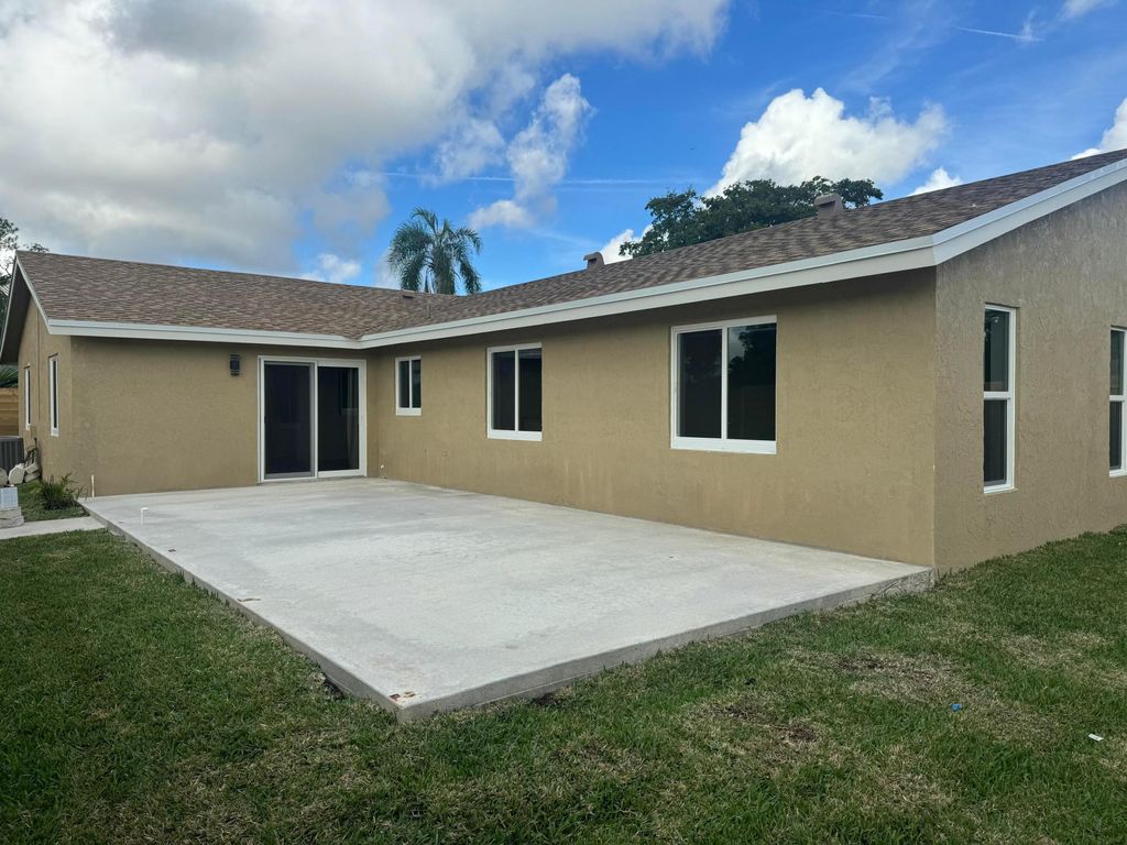 Photo of 4735 Blue Pine Circle, Lake Worth, FL 33463 (MLS # R11161245)