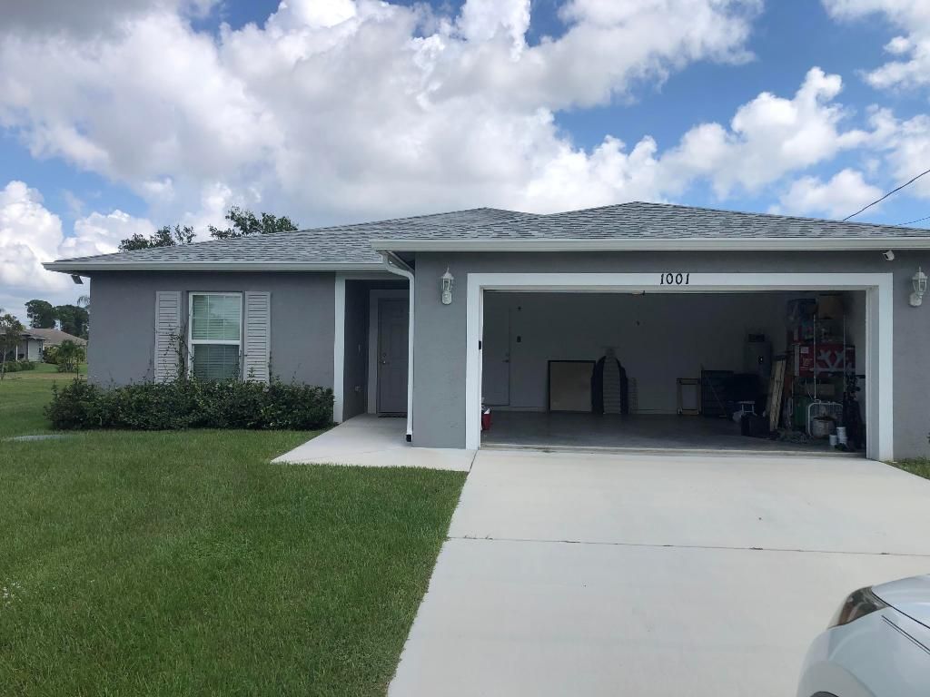 Photo of 1001 SW Gastador Avenue, Port Saint Lucie, FL 34953 (MLS # R10943859)