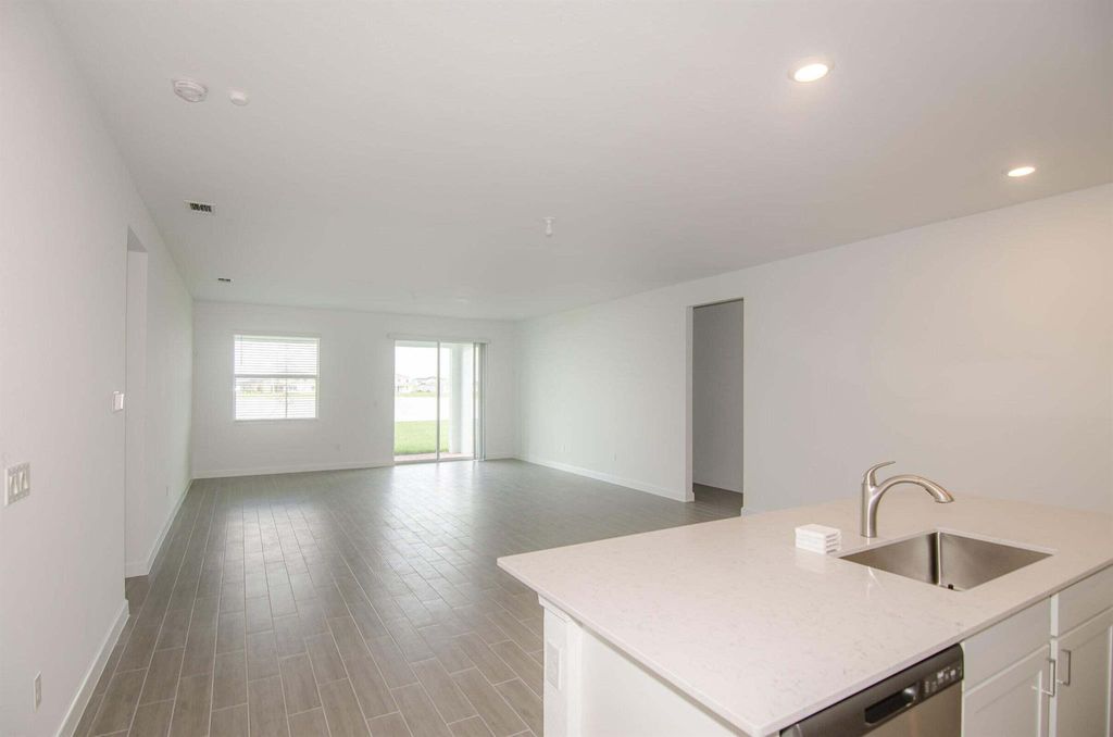 Photo of 7569 NW Deysbrook Ln, Port Saint Lucie, FL 34987 (MLS # R11028718)