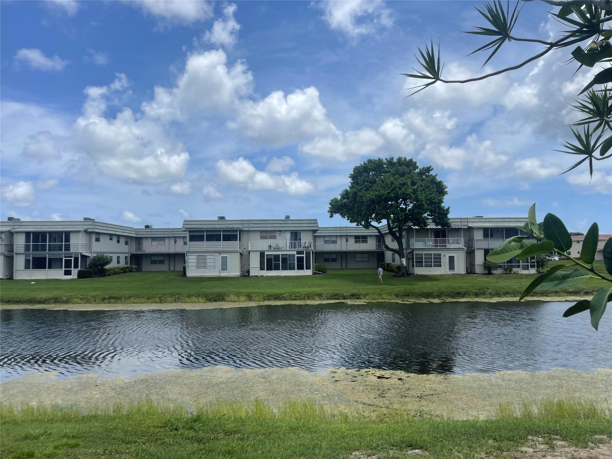 Seasonal rental. Rarely available tastefully furnished 1st floor lake view 2/2 condo located in the walking distance to the swimming pool. 55+ community Kings Point offers state of the art amenities, heated water pools, sauna, jacuzzi, gym, sports, clubs by interests, kife entertainment, bus shuttles and much more. Located in the walking distance to shopping, places of worship, restaurants and the beach. Also available for annual rent at $2150/month.