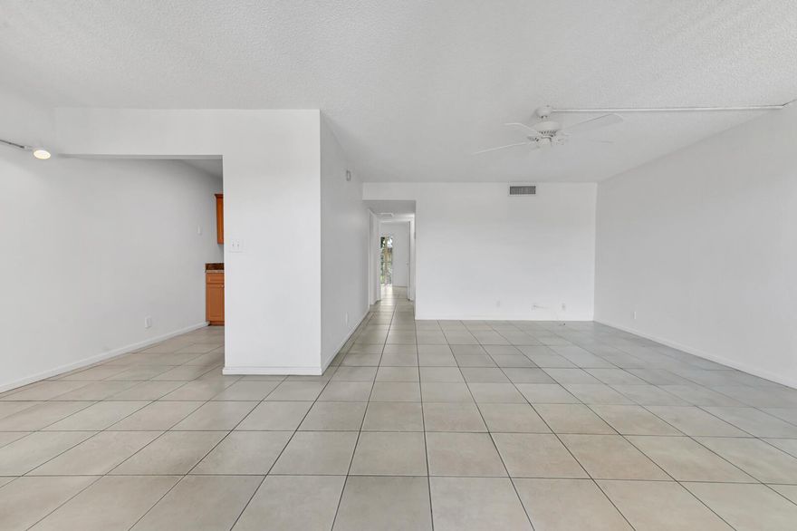 Experience the perfect blend of comfort and convenience in this deceivingly spacious, move-in-ready condo, an ideal retreat for a 55+ adult. This beautifully updated, 2-bedroom, 1.5-bath unit offers a fresh and modern feel. The entire living area, along with both bedrooms, is finished with elegant ceramic tile flooring, creating a seamless and easy-to-maintain living space. The bathrooms have vanities and stylish top-flush toilets.