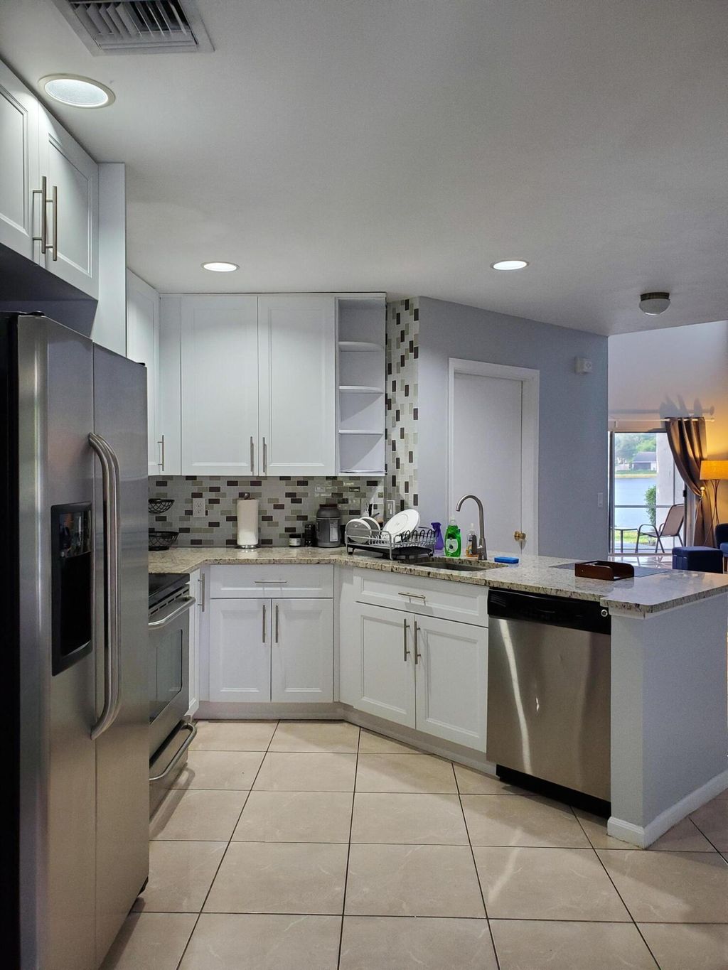 Photo of 40 Desford Lane, Boynton Beach, FL 33426 (MLS # R10987654)