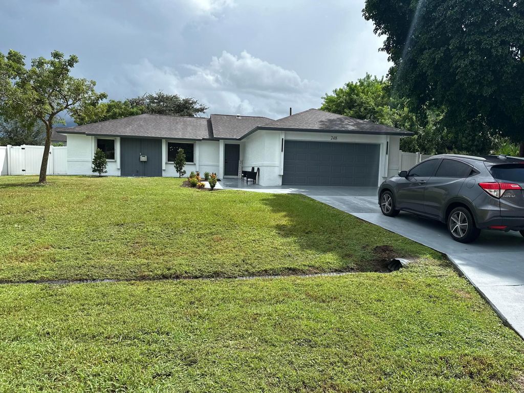 Photo of 248 SE Fallon Drive, Port Saint Lucie, FL 34983 (MLS # R11127000)
