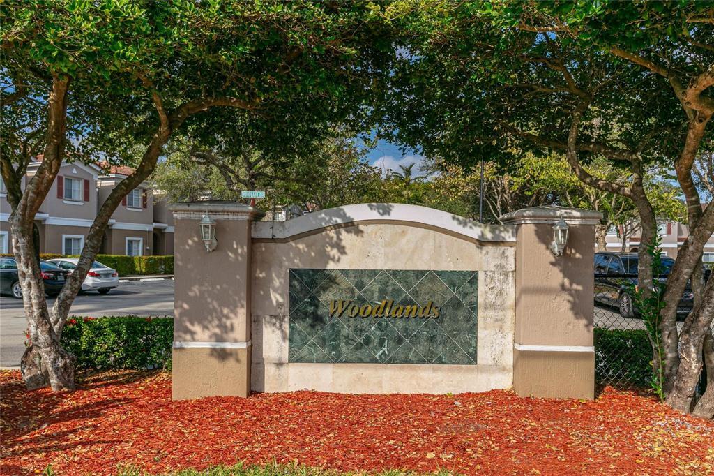 Photo of 4408 Woodland Circle, Tamarac, FL 33319 (MLS # B26066087)