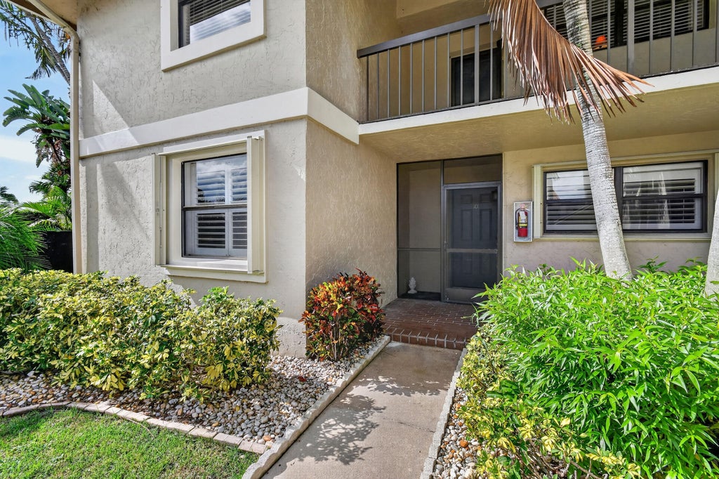 Photo of 13335 Touchstone Pl #101 D, Palm Beach Gardens, FL 33418 (MLS # B26073318)