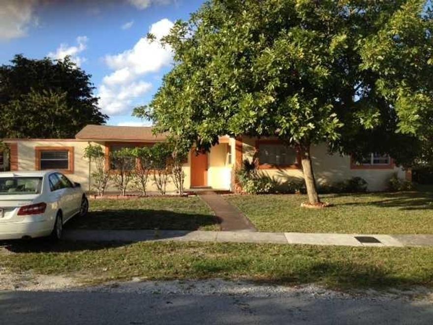 Large 4 bedroom, 2 bath house with extra room which could be used as another bedroom or an office. Central AC and a stainless steel dishwasher, microwave and fridge. Also there is a laundry room with plenty of cabinets and front loading washer and dryers. House has a 6 foot privacy fence around the back yard. 7 ceiling fans throughout the house. Newer kitchen. New large porcelain tiles in the bedrooms. Must see house. Close to center of ft. Lauderdale and the beach.
