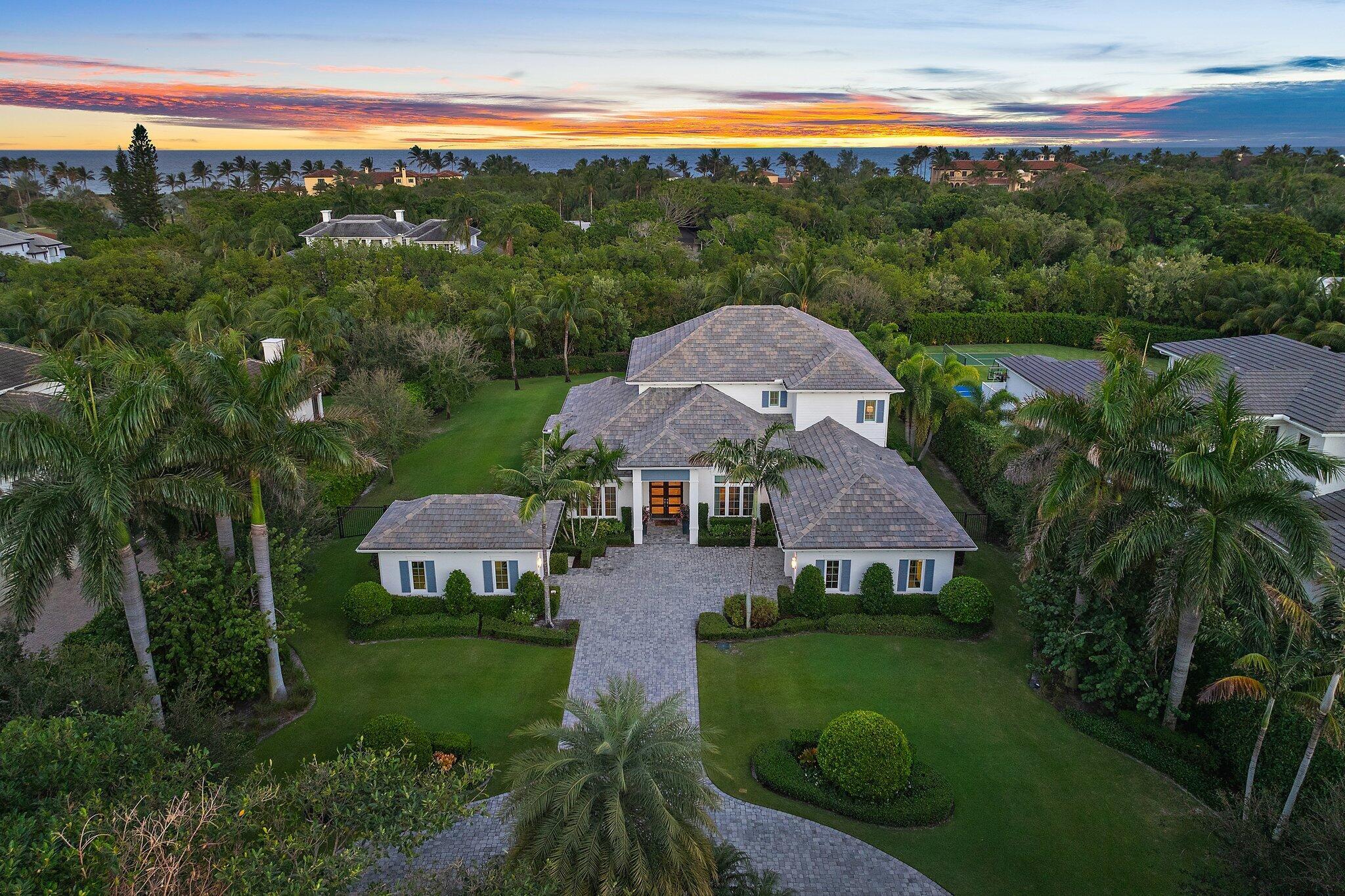 This is the one! Being offered fully furnished, this stunning property in a premier private location, on an acre of property with designer finishes, is priced to sell. A spectacular home that offers the pinnacle of Florida living with every modern amenity. Built in 2016 and offering 6,550 total square feet, five bedrooms, five full and one-half baths. Sun lit rooms flow easily to a tropical outdoor paradise complete with summer kitchen with a covered dining area. An oversized pool and jacuzzi with sun shelf accommodate all types of fun in the sun and are located just steps to the large fire pit. Manicured grounds and expansive entertaining space accommodate every possible option from family barbeque to a cocktail party for 50.