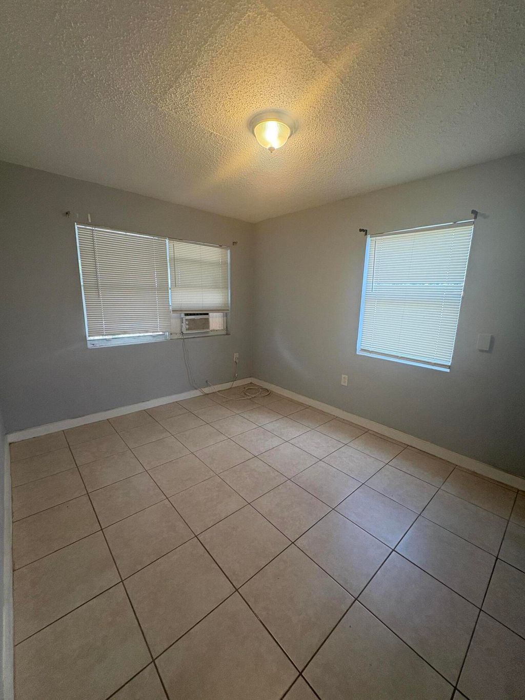 Photo of 3172 N 2nd Ave Ave N #A, Palm Springs, FL 33461 (MLS # B26001025)