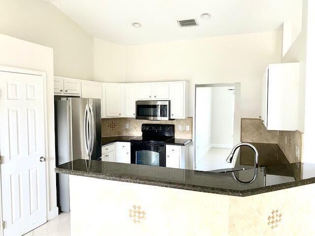 Photo of 598 NW KINGSTON Street, Port Saint Lucie, FL 34983 (MLS # B26073696)
