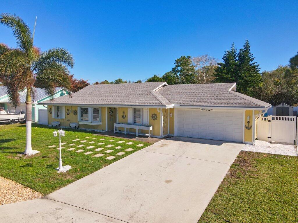 Photo of 888 NE Maranta Terrado, Jensen Beach, FL 34957 (MLS # B26067017)