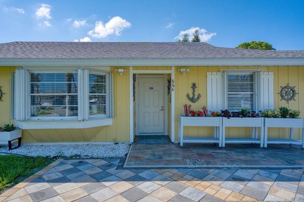 Photo of 888 NE Maranta Terrado, Jensen Beach, FL 34957 (MLS # B26067017)