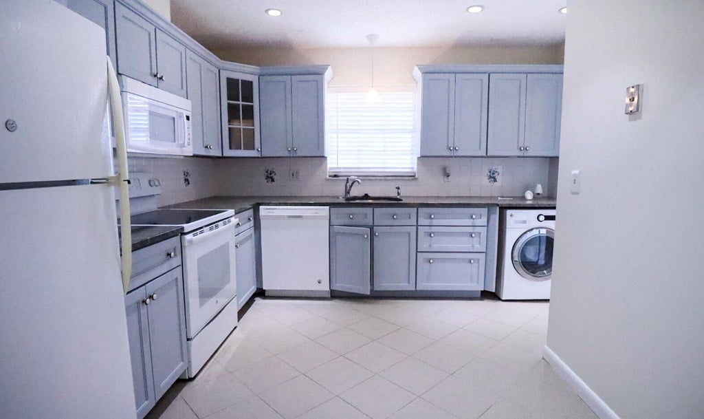 Photo of 845 Salem Lane, Lake Worth, FL 33467 (MLS # R11046931)