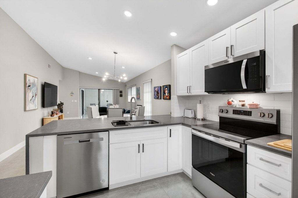 Photo of 6175 Kings Gate Circle, Delray Beach, FL 33484 (MLS # B26003498)