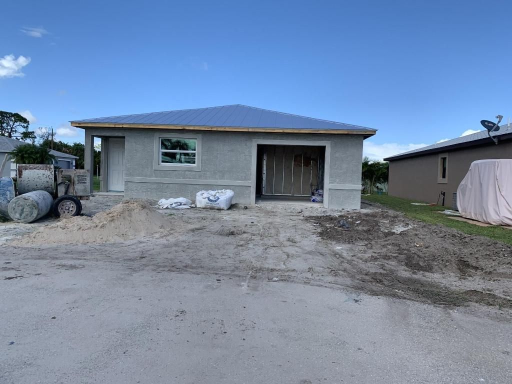 Photo of 4 Rio De Palmas, Fort Pierce, FL 34951 (MLS # R11125446)