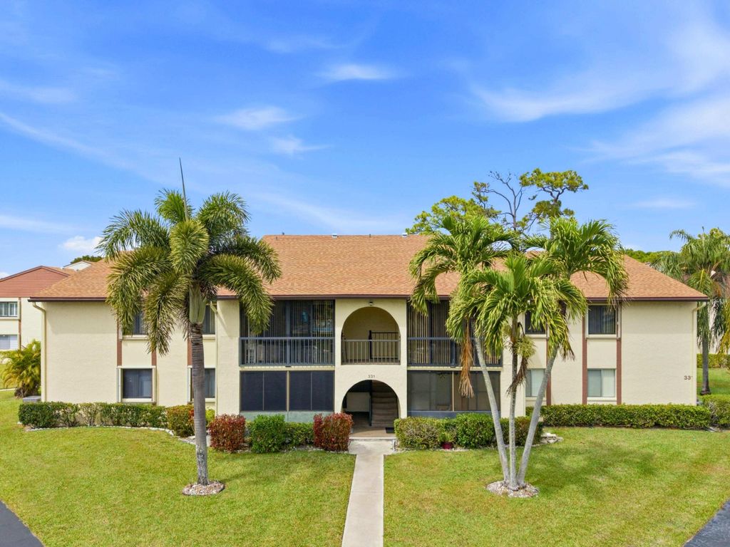 Photo of 331 Knotty Pine Circle #D-2, Greenacres, FL 33463 (MLS # R11168217)