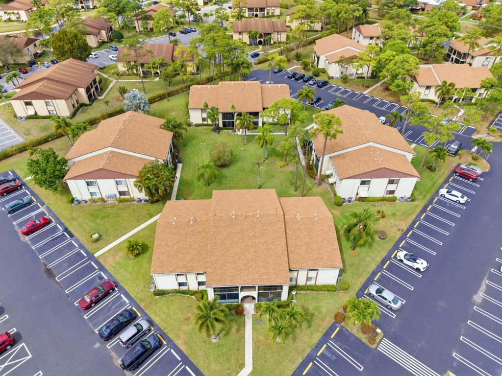 Photo of 331 Knotty Pine Circle #D-2, Greenacres, FL 33463 (MLS # R11168217)