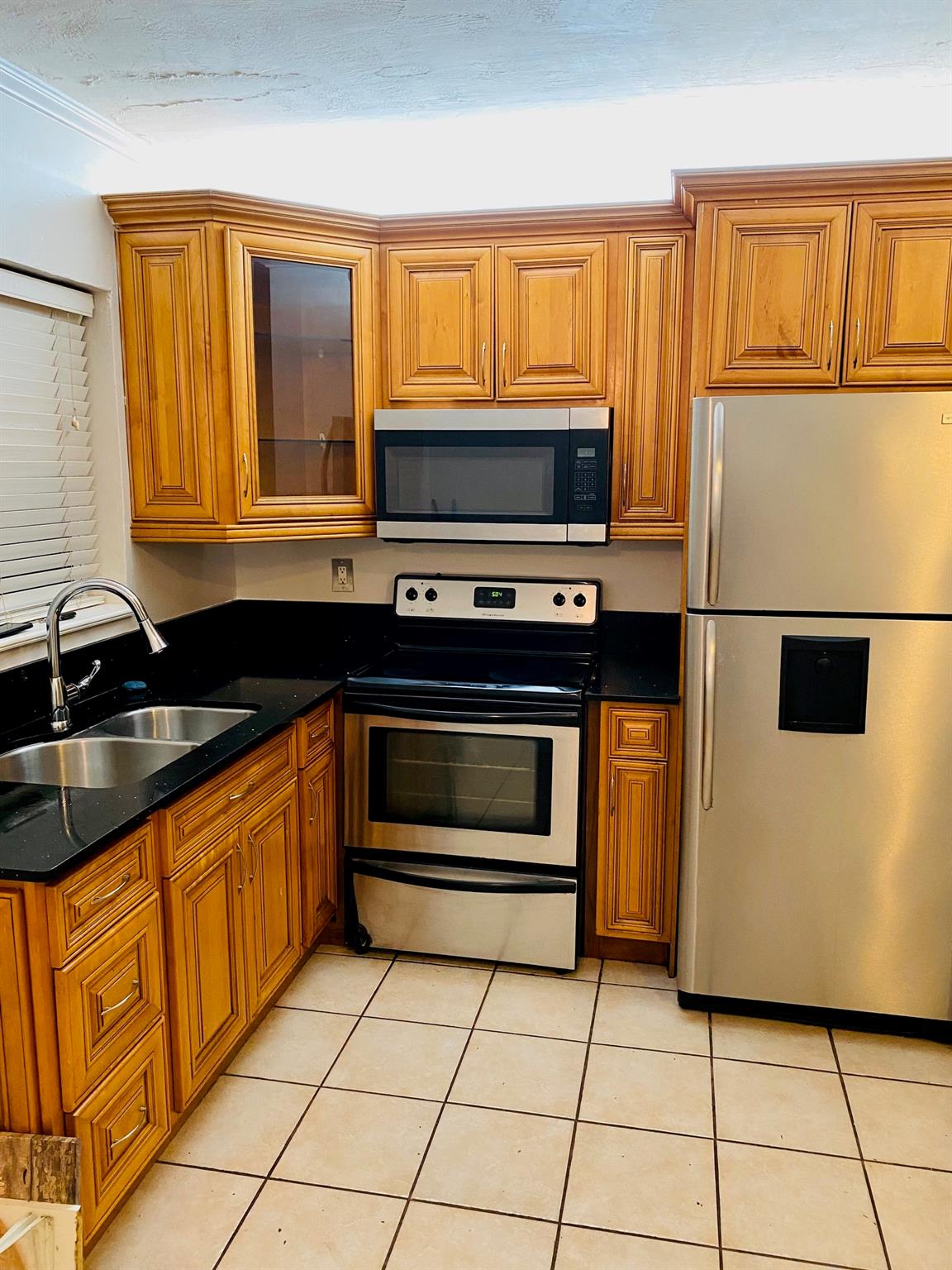 Great location East of U.S. 1 and close to beaches and golf courses! First floor apartment, tiled throughout with open kitchen, stainless steel appliances, tankless water heater, updated bathroom and walk-in closet. Community laundry facility located in the building and close to the apartment. One assigned parking space only. Close to Young Circle entertainment and restaurants. 2-mile bike ride/walk/jog (6 minute drive) to Hollywood Beach and 15 minute drive to Fort Lauderdale Airport. Landlord requires renters insurance. 1st month, last month and security to move in.