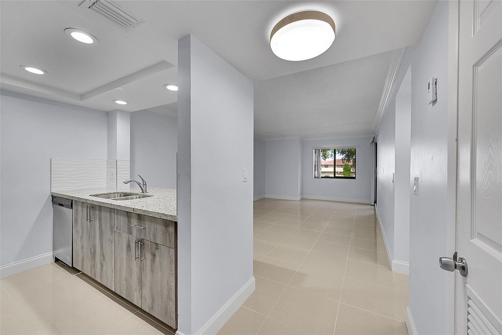 Photo of 10001 W Atlantic Blvd #221, Coral Springs, FL 33071 (MLS # F10540889)