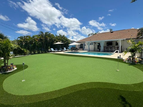 Photo of 2355 SW Neal Road, Port Saint Lucie, FL 34953 (MLS # B26084097)