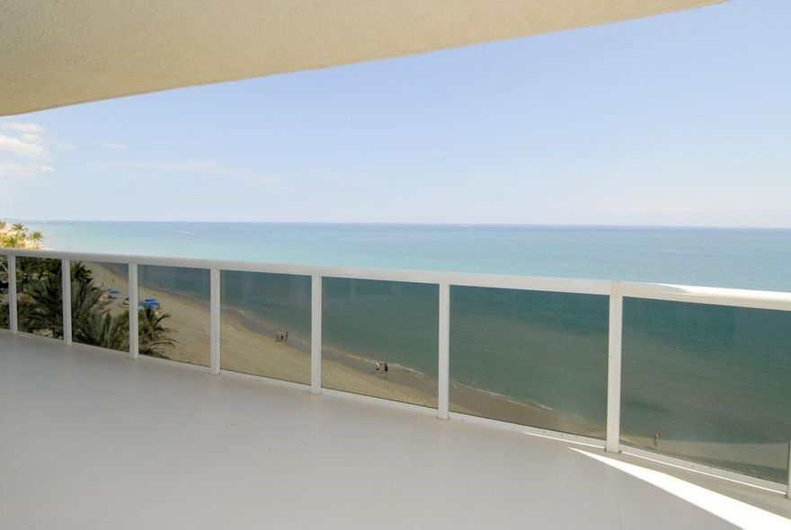 OUTSTANDING SUB-PENTHOUSE.D-I-R-E-C-T OCEANFRONT CORNER. Almost 3000 sq ft with huge wrap-around terrace. HURRICANE IMPACT WINDOWS.  Sweeping views ocean views from E-V-E-R-Y room. 10 foot ceilings. Private elevator. Custom , eat-in  chef's kitchen with high end appliances . Designer crafted features including open kitchen to great room ,  storage built-ins, designer accent walls , custom closets, 4 spectacular bathrooms and wall bed unit and desk in 3rd bedroom. TWO SELF PARKING GARAGE SPACES plus valet for guests. TWO PETS, ANY SIZE, OK. Resort-like complex with concierge,  poolside restaurant, spas, pools, 2 clay tennis courts, private beach pavilion w attendant, cabanas, tikis,  BBQ and pet park. Furnishings are available. EASY TO SEE