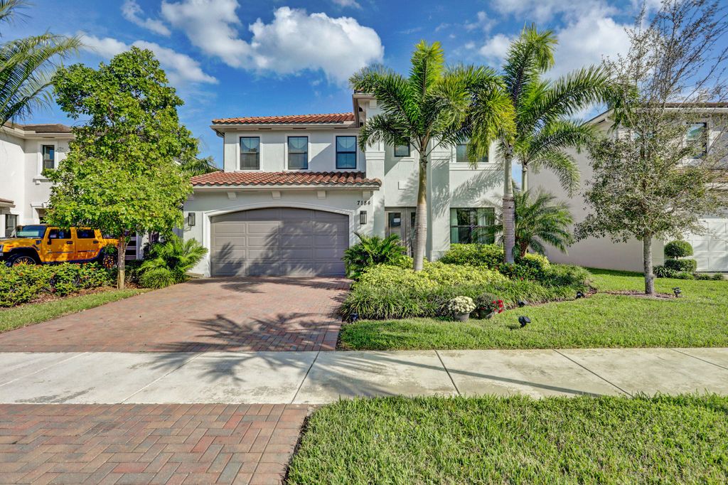 Photo of 7184 Montereal Path, Lake Worth, FL 33463 (MLS # B26000854)