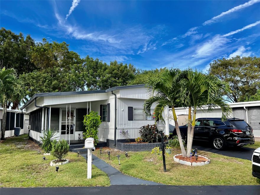 DO NOT MISS THIS OPPORTUNITY! THIS IS A  SPACIOUS 2/2 MOBILE HOME LOCATED AT DEERFIELD LAKE, 55+ GATED COMMUNITY. IT REQUIRES APPROVAL AND IT MAY TAKES MORE THAN A WEEK. THE LOT  RENTAL PER MONTH IS $980.00.  LOTS OF CABINETS FOR STORAGE, ENCLOSED FLORIDA ROOM. WASHER AND DRYER INSIDE THE FLORIDA ROOM. LARGE SHED WITH ADDITIONAL STORAGE. CALL LISTING AGENT TO SCHEDULE A SHOWING, IT WON'T LAST TOO LONG!