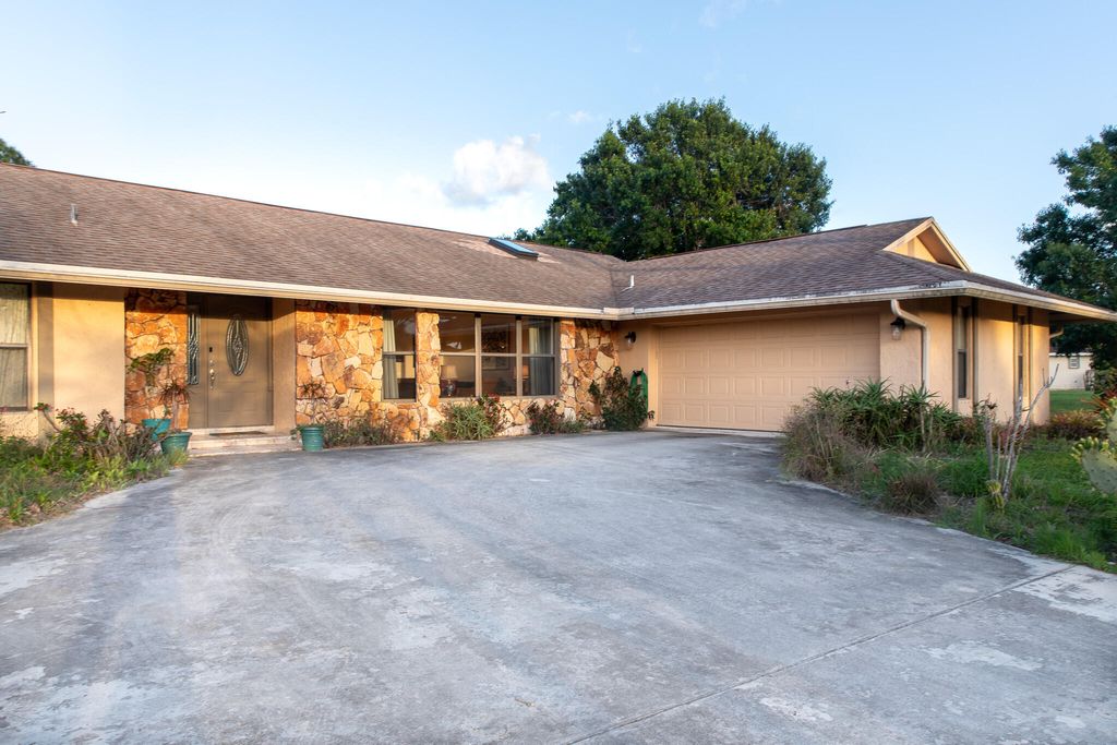Photo of 2681 SE Delong Road, Port Saint Lucie, FL 34952 (MLS # B26016344)