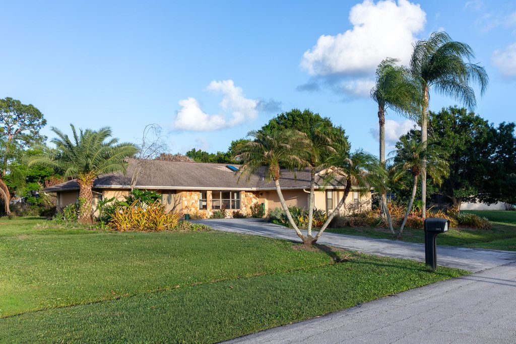 Photo of 2681 SE Delong Road, Port Saint Lucie, FL 34952 (MLS # B26016344)