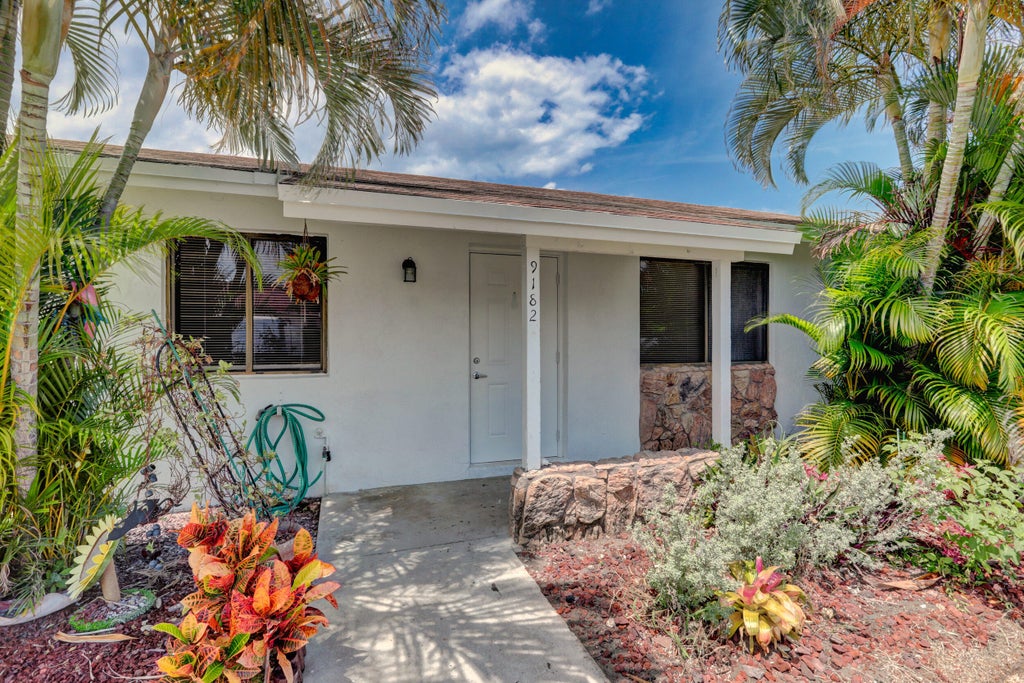 Photo of 9186 Roan Lane, West Palm Beach, FL 33403 (MLS # B26041574)