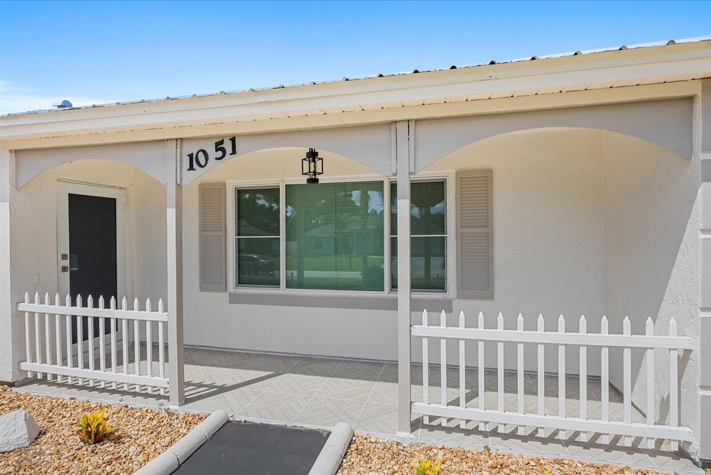 Photo of 1051 SW DUBOIS AVE, Port Saint Lucie, FL 34953 (MLS # B26082196)