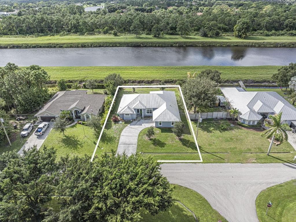 Photo of 1538 SW Abacus Avenue, Port Saint Lucie, FL 34953 (MLS # R11131976)