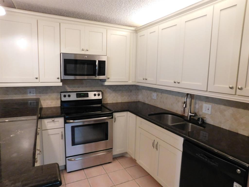 Photo of 121 1st Lane Ln, Palm Beach Gardens, FL 33418 (MLS # R10729239)