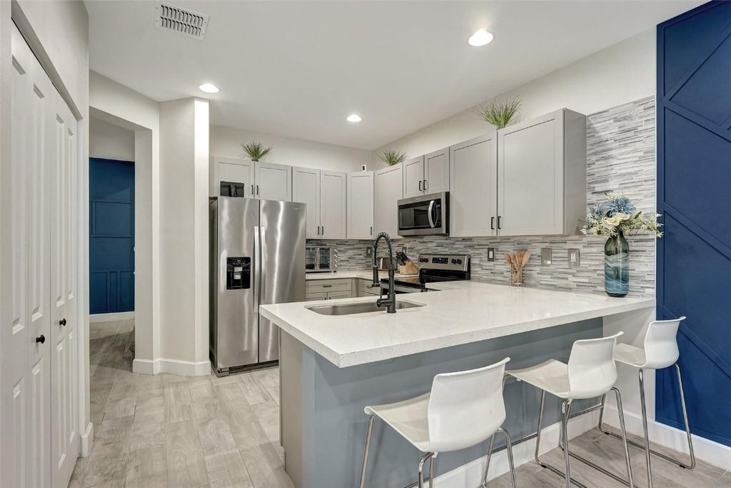 Photo of 4927 NW 48th Terrace, Tamarac, FL 33319 (MLS # F10488828)