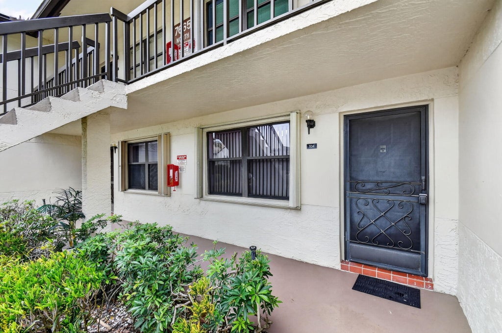 Photo of 7665 TAHITI Lane #104, Lake Worth, FL 33467 (MLS # B26080404)