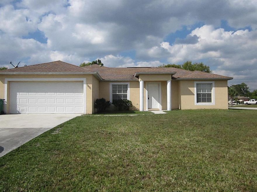 House located off California.  Tile in common areas, house has formal living and formal dining room with screened back patio.