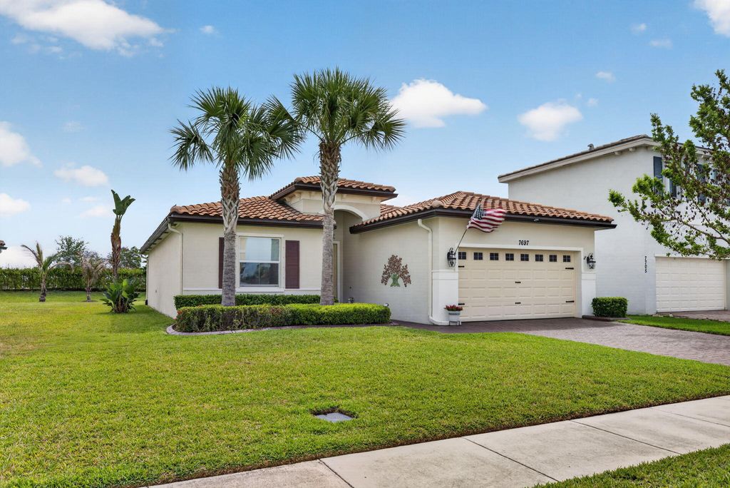 Photo of 7697 NW Greenbank Circle, Port Saint Lucie, FL 34987 (MLS # B26021230)
