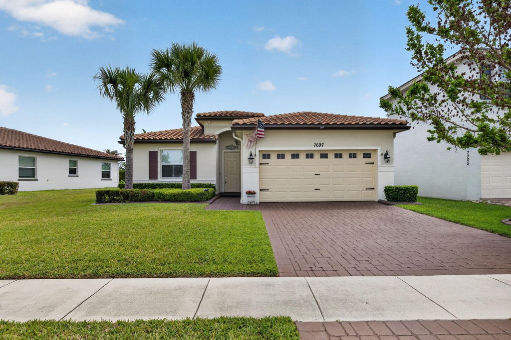 Photo of 7697 NW Greenbank Circle, Port Saint Lucie, FL 34987 (MLS # B26021230)