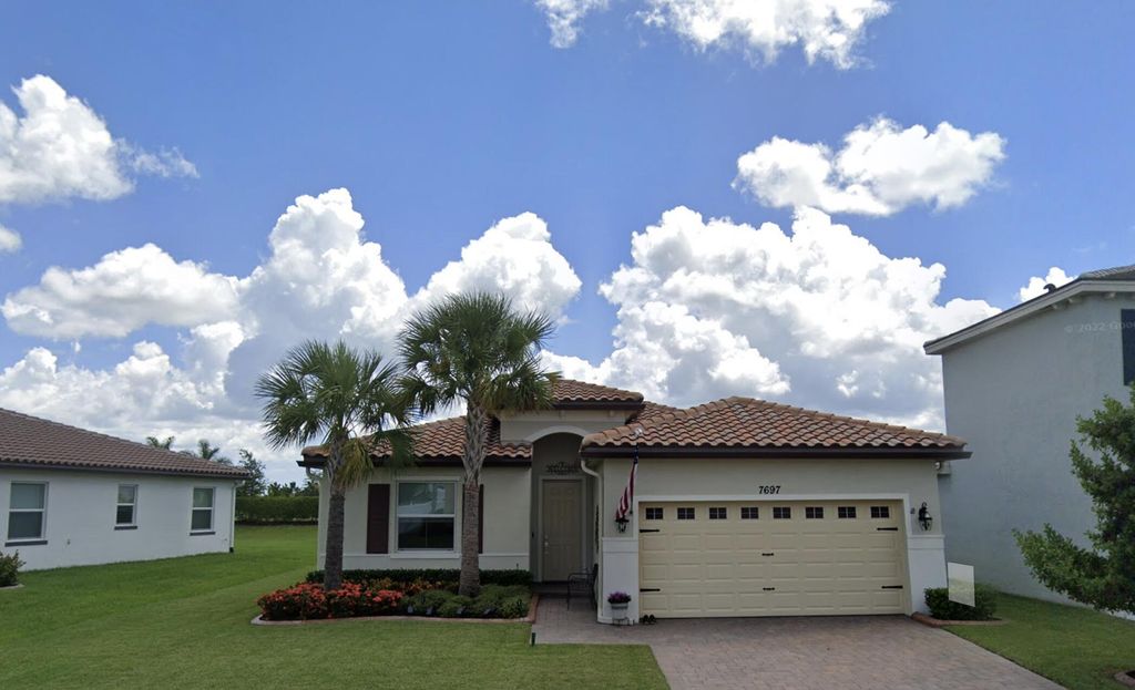 Photo of 7697 NW Greenbank Circle, Port Saint Lucie, FL 34987 (MLS # B26021230)
