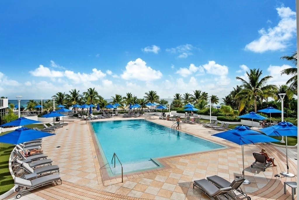Beachfront studio in the heart of Miami Beach, perfectly located just steps from Lincoln Road’s iconic restaurants, shops, and nightlife. This bright, comfortable space features a king-size bed, a cozy couch, and a kitchenette, ideal for seasonal stays, vacations, or extended visits. Enjoy resort-style living with direct beach access, a beautiful lobby, 24/7 doorman, valet parking, fitness center, and a sparkling oceanview pool. Available for short- or long-term stays (pricing varies); taxes apply to rentals under 6 months. Live where Miami’s energy meets the serenity of the sea. Recent updates have been made since the photos were taken — request an up-to-date video tour.